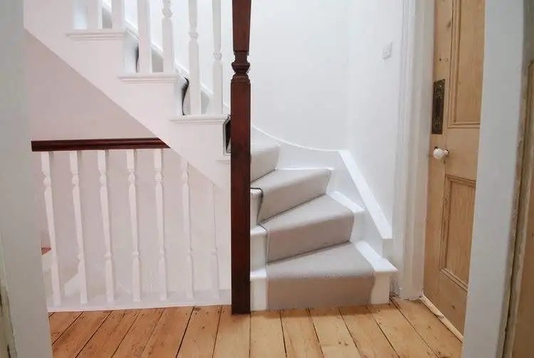 timber staircase with center carpet: Swipe To View More Images