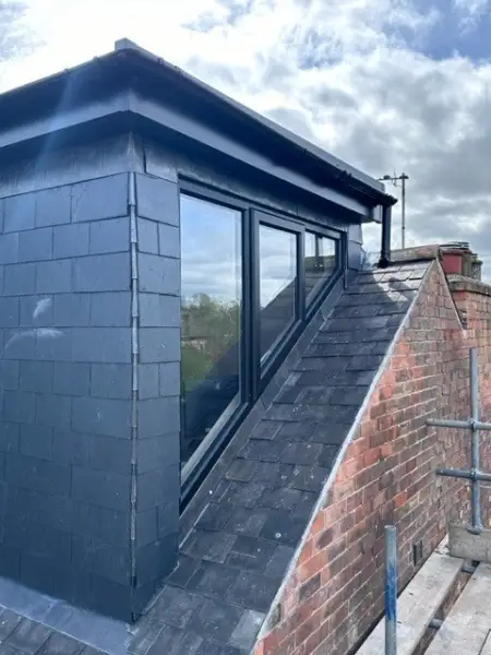 flat roof dormer along off shoot 4: Swipe To View More Images