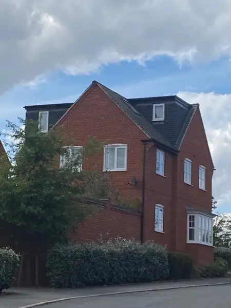 flat roof either side of gable: Swipe To View More Images