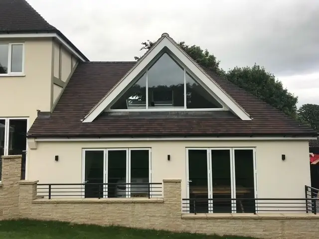 glass gable conversion built above a garage: Swipe To View More Images