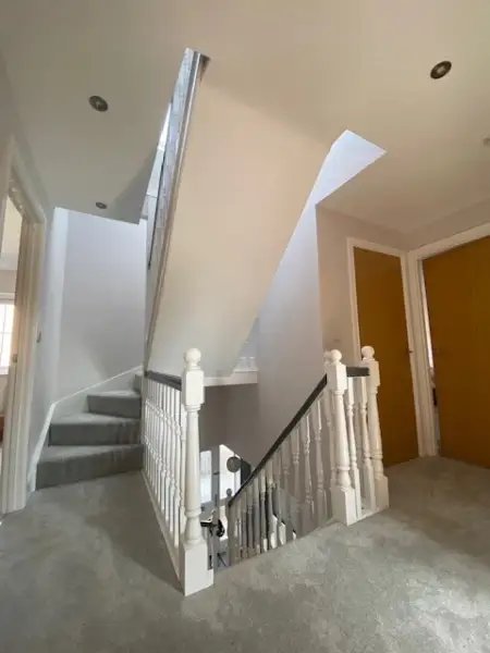 Open staircase with a double handrail: Swipe To View More Images