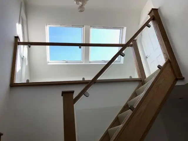 open plan landing with oak and glass balustrade: Swipe To View More Images