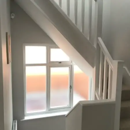 tight staircase cutting across the landing window: Click Here To View Larger Image